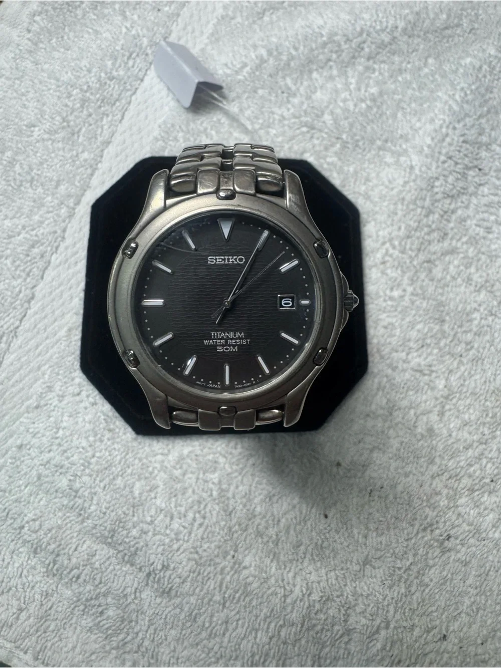 Seiko Titanium Watch with Black Dial and Silver Accents